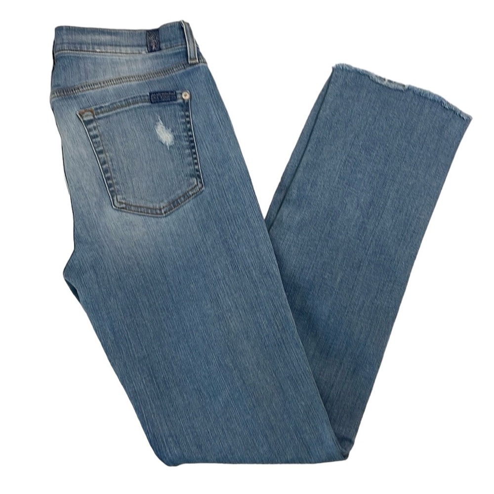 7 For All Mankind Dylan Size‎ 29 distressed light wash jeans.